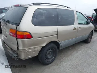 2000 Toyota Sienna CE z VIN 4T3GF19C0YU240639, wystawiony jako IAAI lot #42472106 z przebiegiem 142 456 mil mil oraz . Historia ofert i sprzedaży dostępna na DreamBid. Obrazek 4.