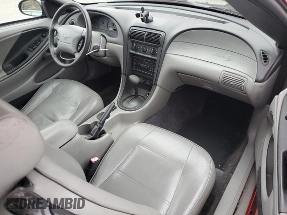 2001 Ford Mustang Deluxe с VIN 1FAFP444X1F234869, выставлен на аукционе Copart как лот 57380035 с пробегом 84 074 миль миль и Списание • Salvage title. История ставок и продаж доступна на DreamBid. Изображение 8.