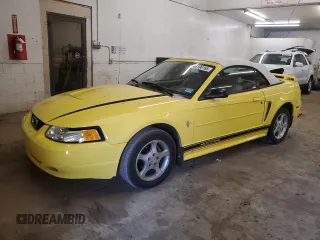 2003 Ford Mustang Deluxe z VIN 1FAFP44473F398549, wystawiony jako Copart lot #56190165 z przebiegiem 135 386 mil mil oraz Szkoda całkowita • Salvage title. Historia ofert i sprzedaży dostępna na DreamBid. Obrazek 1.