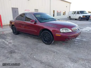 2005 Mercury Sable GS with VIN 1MEFM50U55A600253, listed as a IAAI auction lot 41616733 with 141,936 mi miles. Bid and sale history available at carsss.com. Image 1.