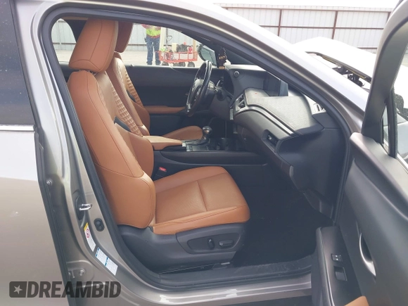 2019 Lexus UX 250h with VIN JTHU9JBH4K2005403, listed as a IAAI auction lot 41952074 with 73,883 mi miles and . Bid and sale history available at DreamBid. Image 5.