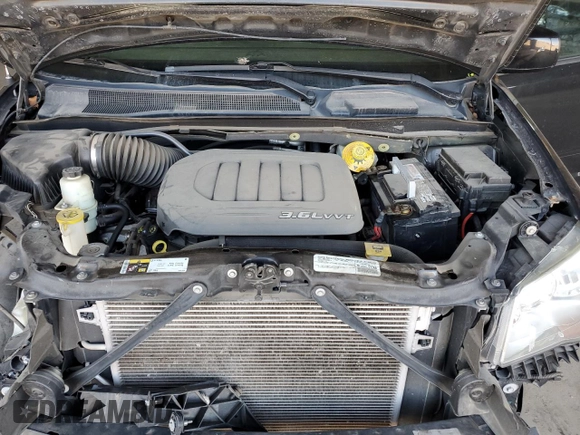 2015 Dodge Grand Caravan SXT with VIN 2C4RDGCG5FR632388, listed as a Copart auction lot 54719625 with 67,996 mi miles and Salvage Title. Bid and sale history available at DreamBid. Image 12.