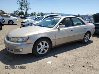 2001 Lexus ES 300 with VIN JT8BF28G210342201, listed as a Copart auction lot 55067975 with 235,165 mi miles and Salvage Title. Bid and sale history available at DreamBid. Image 1.
