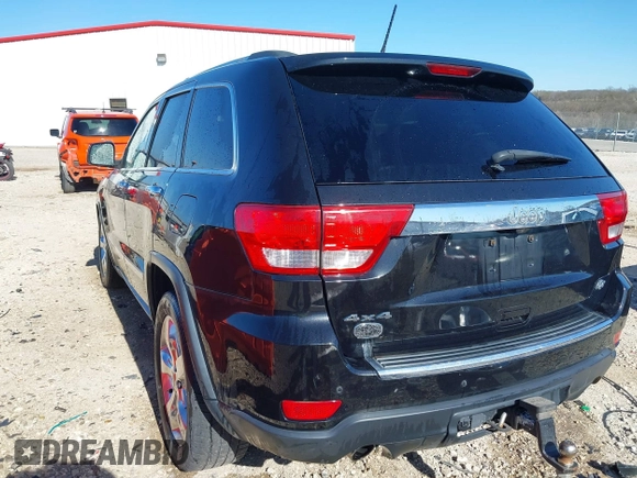 2013 Jeep Grand Cherokee Overland with VIN 1C4RJFCT1DC654653, listed as a IAAI auction lot 41826619 with 124,283 mi miles. Bid and sale history available at carsss.com. Image 3.