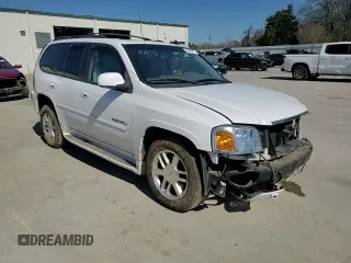 2006 GMC Envoy Denali with VIN 1GKET63M762190296, listed as a Copart auction lot 46691595 with 128,985 mi miles and Salvage Title. Bid and sale history available at carsss.com. Image 11.