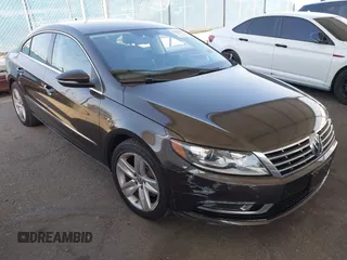 2015 Volkswagen CC R-Line with VIN WVWBP7AN4FE823632, listed as a IAAI auction lot 41852031 with 60,197 mi miles and . Bid and sale history available at DreamBid. Image 1.