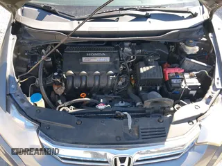 2012 Honda Insight LX with VIN JHMZE2H56CS004226, listed as a IAAI auction lot 41705401 with 131,761 mi miles and . Bid and sale history available at DreamBid. Image 10.