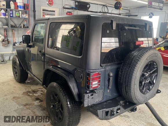 2017 Jeep Wrangler Willys Wheeler with VIN 1C4AJWAGXHL602088, listed as a Copart auction lot 45524745 with 101,847 mi miles and Clean Title. Bid and sale history available at DreamBid. Image 3.