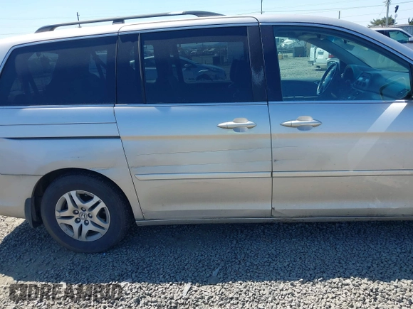 2006 Honda Odyssey EX-L with VIN 5FNRL38726B424923, listed as a IAAI auction lot 42099212 with 171,749 mi miles. Bid and sale history available at carsss.com. Image 6.