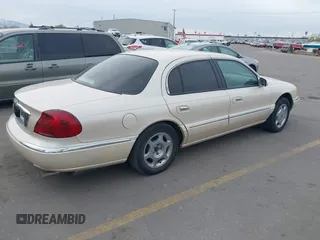 2001 Lincoln Continental with VIN 1LNHM97V51Y602324, listed as a IAAI auction lot 42053789 with 192,221 mi miles. Bid and sale history available at carsss.com. Image 4.