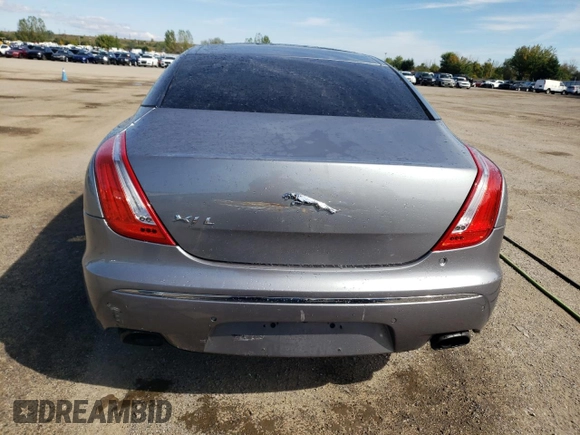 2011 Jaguar XJ with VIN SAJXA2GE5BMV13122, listed as a Copart auction lot 73113044 with 164,196 mi miles and Salvage Title. Bid and sale history available at DreamBid. Image 6.