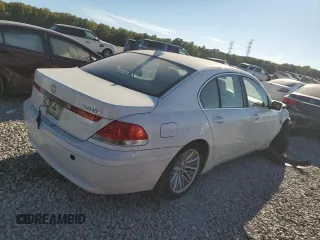 2004 BMW 7 Series 745i with VIN WBAGL63484DP68795, listed as a Copart auction lot 77201084 with 134,044 mi miles and Salvage Title. Bid and sale history available at DreamBid. Image 3.
