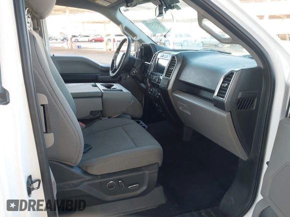 2015 Ford F-150 XLT z VIN 1FTEX1E87FFD13249, wystawiony jako IAAI lot #41214373 z przebiegiem 66 076 mil mil oraz . Historia ofert i sprzedaży dostępna na DreamBid. Obrazek 5.