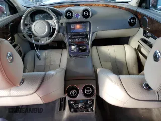 2011 Jaguar XJ with VIN SAJWA1CB4BLV07268, listed as a Copart auction lot 46994555 with 102,432 mi miles and Salvage title. Bid and sale history available at DreamBid. Image 8.