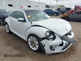 2019 Volkswagen Beetle S with VIN 3VWFD7AT2KM701622, listed as a IAAI auction lot 41520300 with 1 mi miles. Bid and sale history available at carsss.com. Image 1.