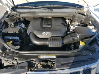 2013 Jeep Grand Cherokee Overland with VIN 1C4RJECG9DC644823, listed as a Copart auction lot 83232414 with 193,205 mi miles and Salvage Title. Bid and sale history available at carsss.com. Image 12.