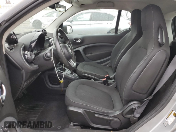 2016 Smart fortwo Passion with VIN WMEFJ5DA1GK062837, listed as a Copart auction lot 59629665 with 58,836 mi miles and Salvage title. Bid and sale history available at DreamBid. Image 7.