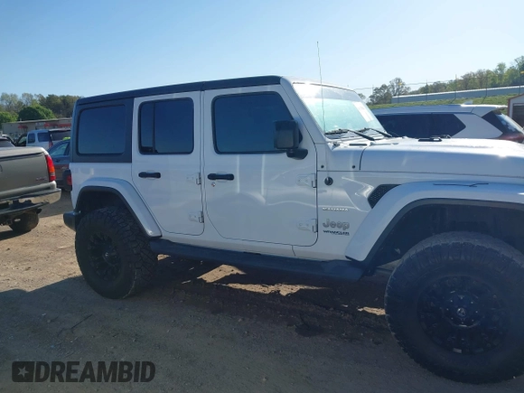 2019 Jeep Wrangler Unlimited Sahara with VIN 1C4HJXEN2KW591557, listed as a IAAI auction lot 41962034 with 88,691 mi miles and . Bid and sale history available at DreamBid. Image 13.
