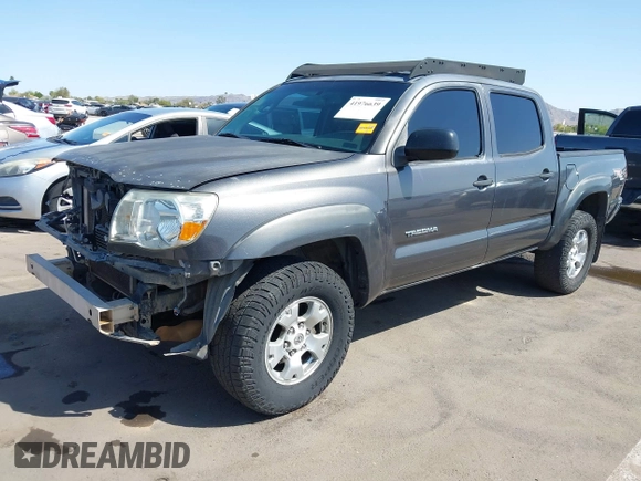 2011 Toyota Tacoma PreRunner with VIN 3TMJU4GN4BM114858, listed as a IAAI auction lot 41976639 with 296,849 mi miles and . Bid and sale history available at DreamBid. Image 18.