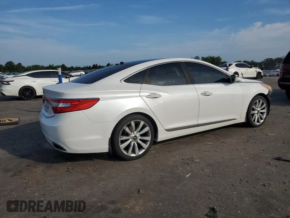 2013 Hyundai Azera с VIN KMHFH4JG4DA330015, выставлен на аукционе Copart как лот 62757555 с пробегом 128 339 миль миль и Чистый • Clean title. История ставок и продаж доступна на DreamBid. Изображение 3.