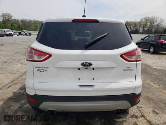 2014 Ford Escape SE with VIN 1FMCU0GX6EUD33108, listed as a Copart auction lot 52803435 with 139,539 mi miles and Salvage Title. Bid and sale history available at DreamBid. Image 6.