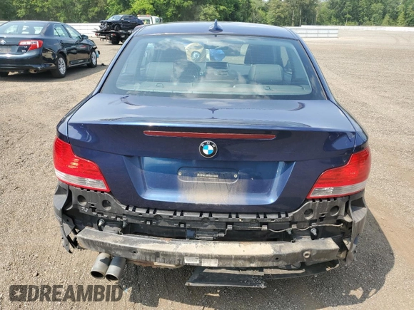 2011 BMW 1 Series 128i with VIN WBAUP7C57BVP21318, listed as a Copart auction lot 60479055 with 102,151 mi miles and Salvage title. Bid and sale history available at DreamBid. Image 6.