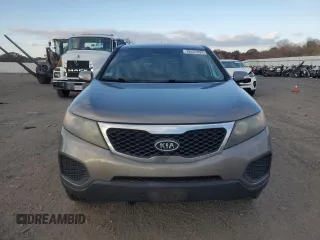 2012 Kia Sorento LX with VIN 5XYKT4A11CG237142, listed as a Copart auction lot 76637024 with 323,504 mi miles and Clean Title. Bid and sale history available at carsss.com. Image 5.
