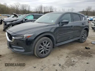 2017 Mazda CX-5 Grand Touring with VIN JM3KFBDL7H0204658, listed as a Copart auction lot 54007165 with 154,546 mi miles and Salvage Title. Bid and sale history available at carsss.com. Image 1.