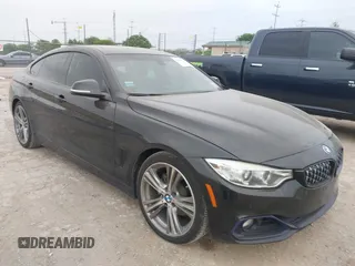 2016 BMW 4 Series 428i z VIN WBA4A9C51GG506512, wystawiony jako IAAI lot #41940754 z przebiegiem 144 999 mil mil oraz . Historia ofert i sprzedaży dostępna na DreamBid. Obrazek 1.