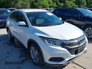 2021 Honda HR-V LX with VIN 3CZRU6H32MM742703, listed as a IAAI auction lot 42225960 with 43,897 mi miles and . Bid and sale history available at carsss.com. Image 1.
