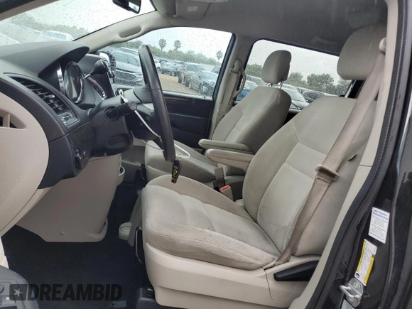 2016 Dodge Grand Caravan SE with VIN 2C4RDGBG9GR346675, listed as a Copart auction lot 56032235 with 154,113 mi miles and Clean Title. Bid and sale history available at DreamBid. Image 7.