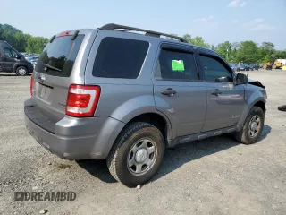 2008 Ford Escape XLS with VIN 1FMCU02Z18KE11979, listed as a Copart auction lot 60212165 with 239,177 mi miles and Salvage title. Bid and sale history available at DreamBid. Image 3.