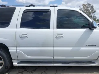 2003 GMC Yukon XL Denali with VIN 1GKFK66UX3J227538, listed as a IAAI auction lot 41915607 with 150,173 mi miles. Bid and sale history available at carsss.com. Image 13.