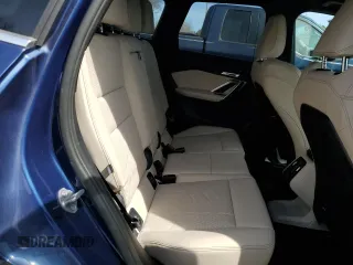 2023 BMW X1 xDrive28i with VIN WBX73EF05P5Y21721, listed as a Copart auction lot 50749295 with 10,633 mi miles and Salvage title. Bid and sale history available at DreamBid. Image 11.