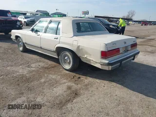 1991 Mercury Grand Marquis z VIN 2MECM75F7MX637786, wystawiony jako IAAI lot #41429297 z przebiegiem 12 512 mil mil oraz . Historia ofert i sprzedaży dostępna na DreamBid. Obrazek 6.