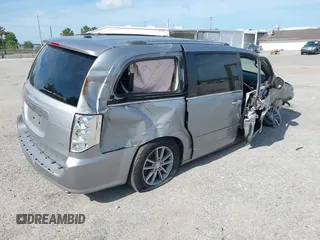 2014 Dodge Grand Caravan SXT with VIN 2C4RDGCG3ER193688, listed as a IAAI auction lot 41290544 with 73,092 mi miles and . Bid and sale history available at DreamBid. Image 4.