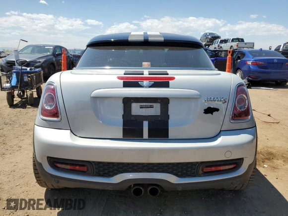 2012 MINI Coupe S z VIN WMWSX3C53CT155039, wystawiony jako Copart lot #56140175 z przebiegiem 114 339 mil mil oraz Nie do naprawy • Non repairable. Historia ofert i sprzedaży dostępna na DreamBid. Obrazek 6.