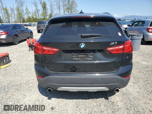 2017 BMW X1 xDrive28i with VIN WBXHT3C32H5F82141, listed as a Copart auction lot 53311785 with 52,867 mi miles and Salvage Title. Bid and sale history available at carsss.com. Image 6.