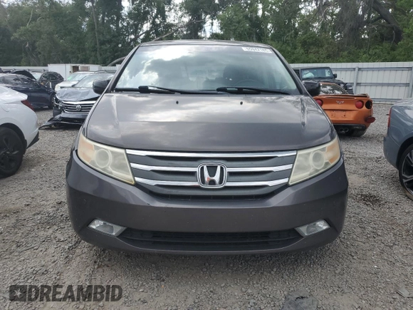2012 Honda Odyssey Touring with VIN 5FNRL5H94CB102177, listed as a Copart auction lot 55942185 with 179,418 mi miles and Salvage Title. Bid and sale history available at DreamBid. Image 5.