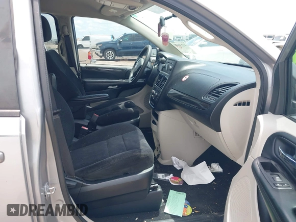 2015 Dodge Grand Caravan American Value with VIN 2C4RDGBGXFR542672, listed as a IAAI auction lot 42230608 with 102,753 mi miles and . Bid and sale history available at DreamBid. Image 5.