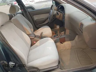 1996 Toyota Camry DX z VIN JT2BG12K0T0417267, wystawiony jako IAAI lot #42386332 z przebiegiem 222 688 mil mil oraz . Historia ofert i sprzedaży dostępna na DreamBid. Obrazek 5.