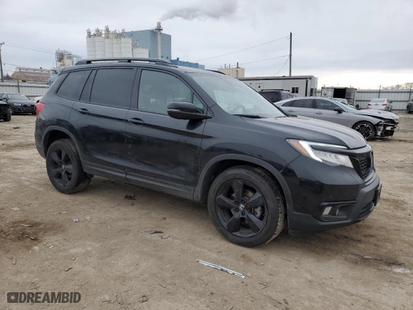 2021 Honda Passport Elite with VIN 5FNYF8H03MB027396, listed as a Copart auction lot 84208414 with 56,641 mi miles and Salvage Title. Bid and sale history available at carsss.com. Image 4.