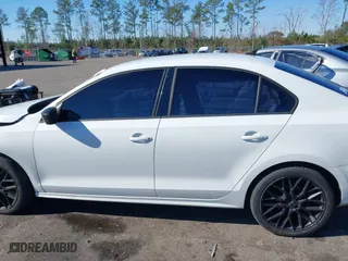2016 Volkswagen Jetta Sedan 1.4T S with VIN 3VW267AJ9GM315200, listed as a IAAI auction lot 41408680 with 140,543 mi miles. Bid and sale history available at carsss.com. Image 14.
