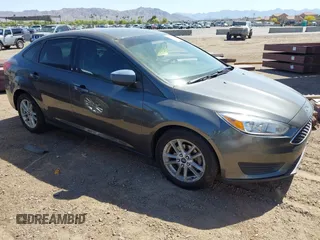 2018 Ford Focus SE with VIN 1FADP3FE6JL270910, listed as a IAAI auction lot 42130371 with 121,240 mi miles. Bid and sale history available at carsss.com. Image 1.