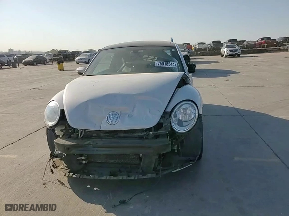 2018 Volkswagen Beetle SE with VIN 3VWJD7AT7JM701754, listed as a Copart auction lot 75018544 with 86,517 mi miles and Salvage Title. Bid and sale history available at carsss.com. Image 11.