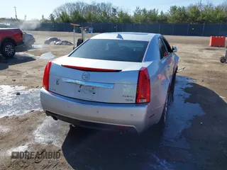 2013 Cadillac CTS Premium with VIN 1G6DP5E39D0100975, listed as a IAAI auction lot 41915113 with 110,436 mi miles and . Bid and sale history available at DreamBid. Image 4.