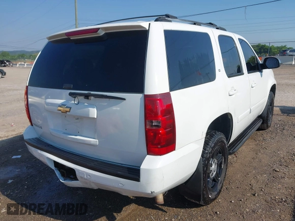 2007 Chevrolet Tahoe LTZ with VIN 1GNFK13057J121978, listed as a IAAI auction lot 42643202 with 240,004 mi miles and . Bid and sale history available at DreamBid. Image 4.