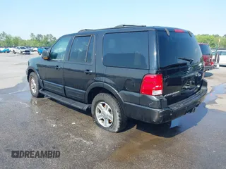 2004 Ford Expedition Eddie Bauer with VIN 1FMPU17L54LA74068, listed as a IAAI auction lot 41974666 with 292,308 mi miles. Bid and sale history available at carsss.com. Image 3.