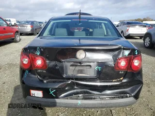 2009 Volkswagen Jetta S с VIN 3VWJZ71K99M049465, выставлен на аукционе Copart как лот 84696904 с пробегом 98 631 миль миль и Списание • Salvage title. История ставок и продаж доступна на DreamBid. Изображение 6.