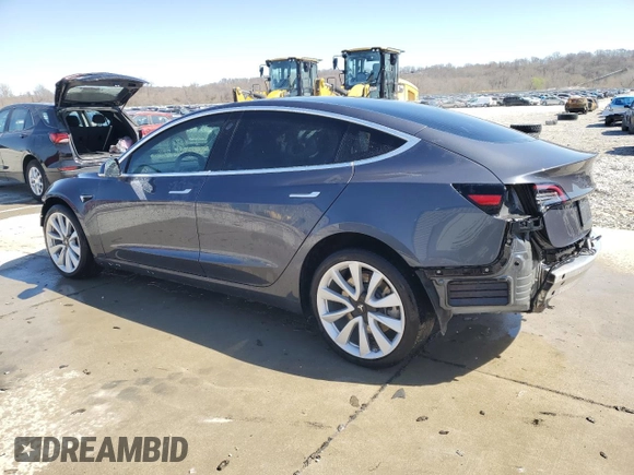 2020 Tesla Model 3 Long Range with VIN 5YJ3E1EBXLF668795, listed as a Copart auction lot 49913515 with 82,962 mi miles and Salvage Title. Bid and sale history available at DreamBid. Image 2.